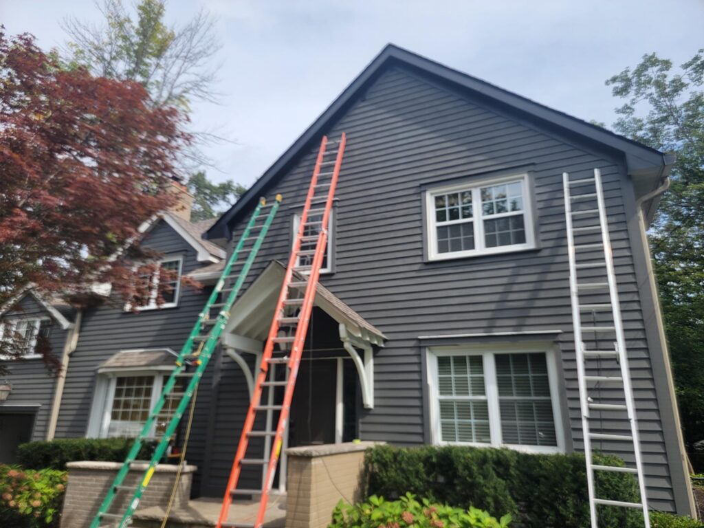 procees of paintinf woos siding